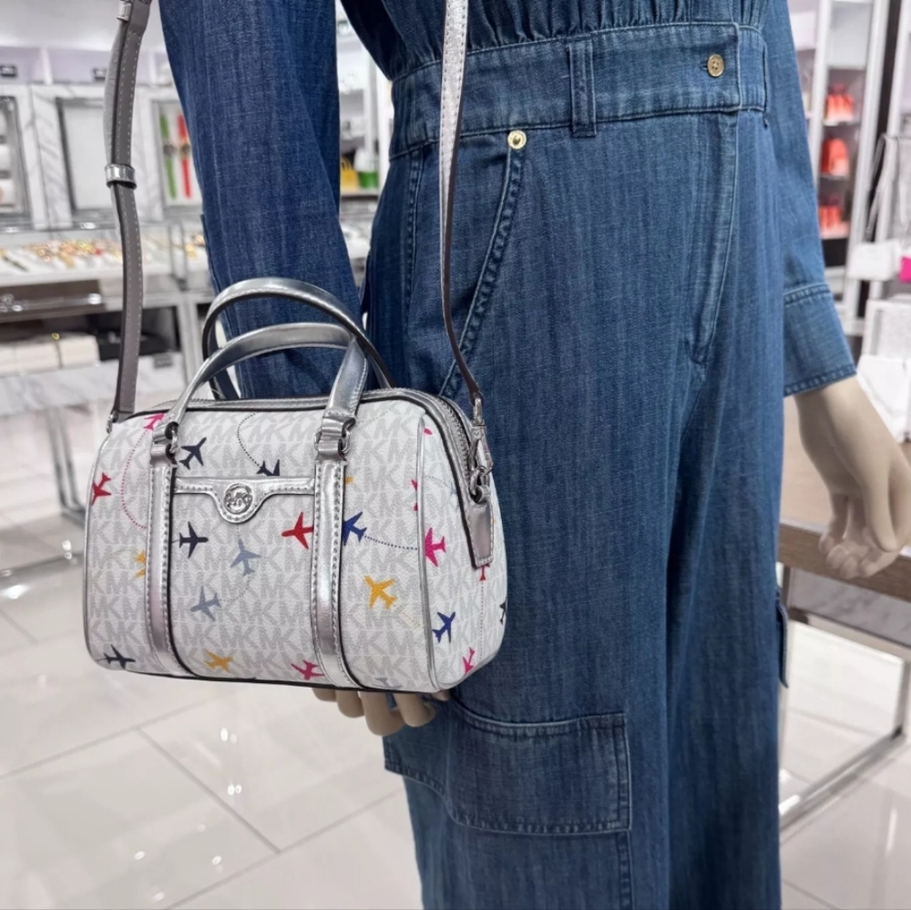 Michael Kors Small Airplane White Duffle Crossbody - Picture 8 of 9